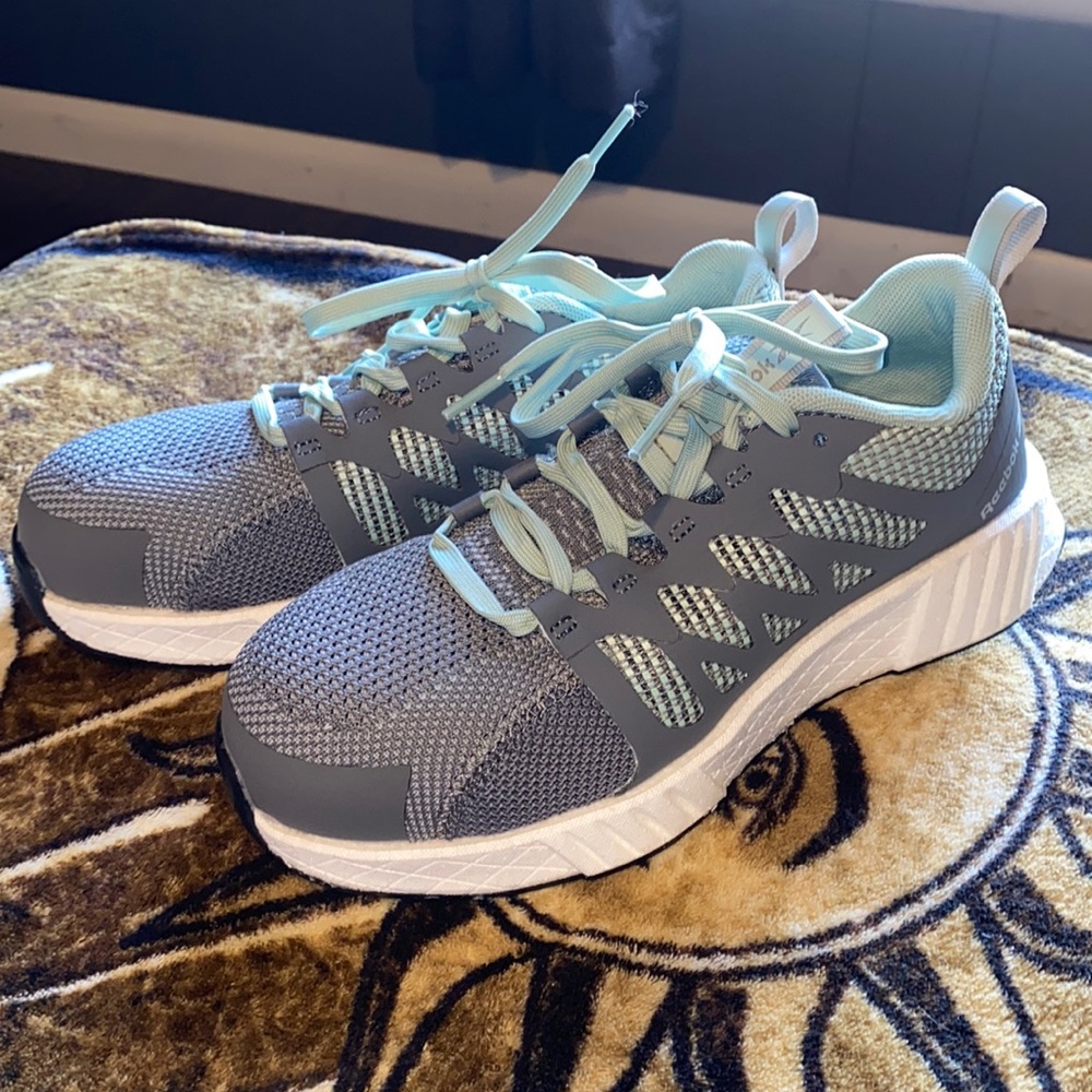 Women’s steel toed Reeboks